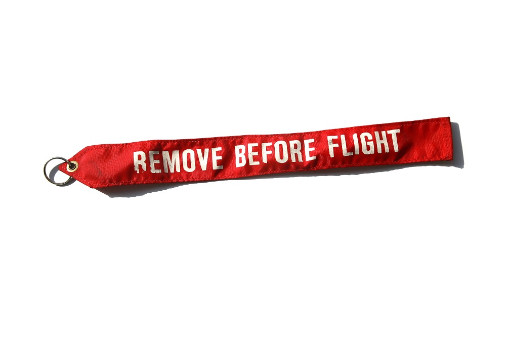 Remove before flight is a safety warning commonly seen on remova